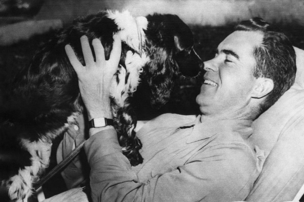 Richard Nixon. Senator and Vice presidential candidate (and future US President) Richard Nixon with his dog, Checkers, 1952. 