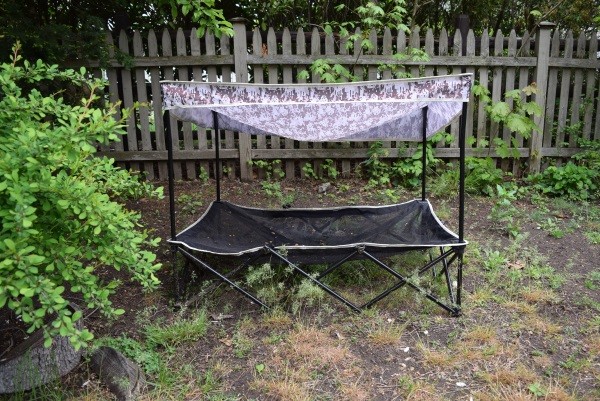 The QuickShade pet bed keeps pup off the muddy ground and also provides a necessary cover.