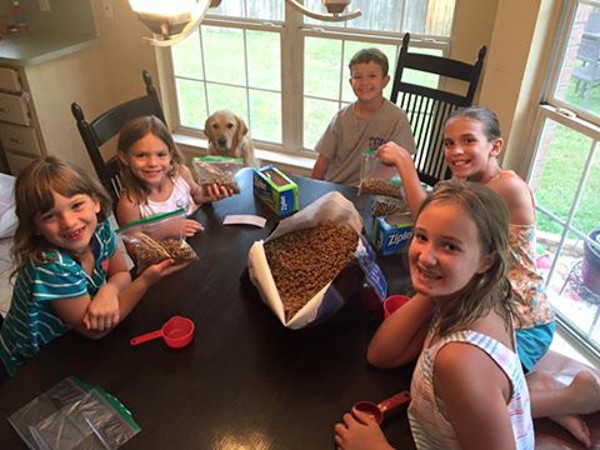 Phoebe and friends getting her food ready for the trip. (Photo via Facebook)