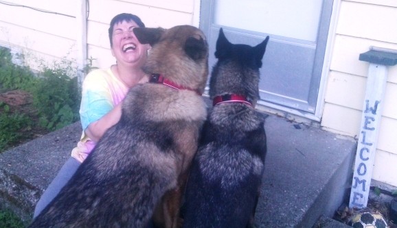 This is my favorite photo of me with my German Shepherds Lola, left, and Lily.