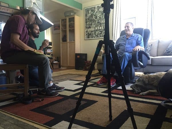Frankie watches as Jim films a promo piece with folks from PAWS/LA in the hopes of helping more people that need assistance. (Photo by Wendy Newell)