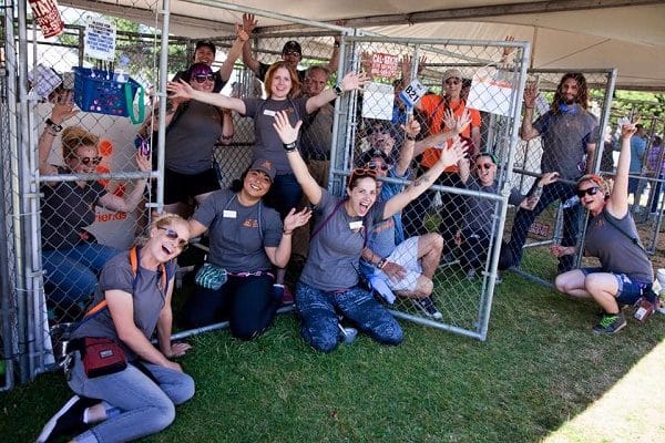 Volunteers and staff of Best Friends Animal Society - Los Angeles, who use an policy, celebrate empty shelter kennels at an adoption event. (Photo courtesy of Best Friends Animal Society's Facebook Page.)