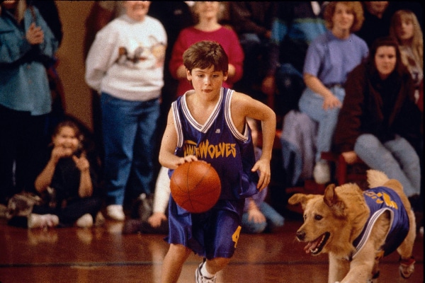 Actor KEVIN ZEGERS as Josh Framm and Buddy The Dog in 'Air Bud.'