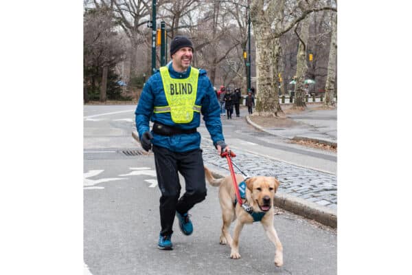 Accomplished distance runner and President/CEO of Guiding Eyes for the Blind Thomas Panek to run the United Airlines NYC Half marathon with several running guide dogs, including yellow Labrador Retriever Yukon.