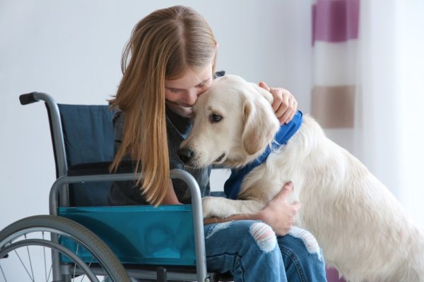 young girl with emotional support dog