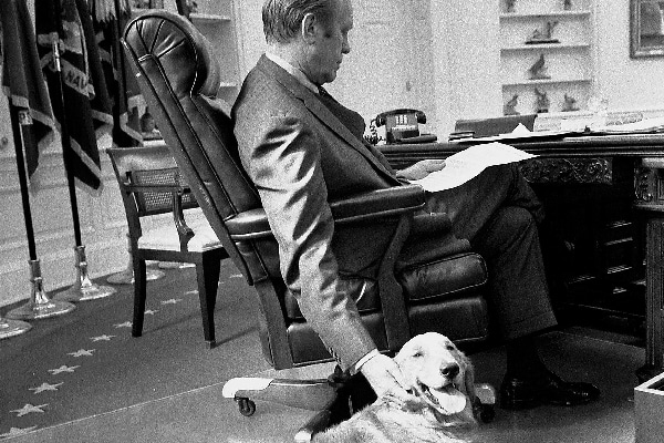 GERALD FORD 38th President of the United States in the Oval Office with his golden retriever Liberty, in November 1974.