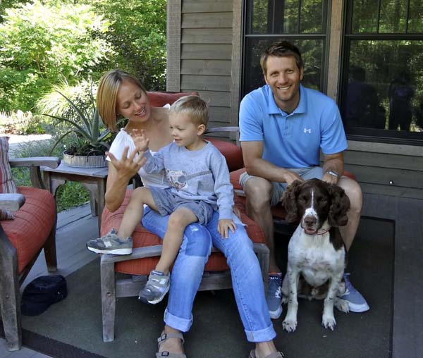 The Golitko family -- Raygan, from left, three-year-old Grissom, Matt, and five-year-old Charlie -- enjoy a dog-friendly vacation together in Michigan.