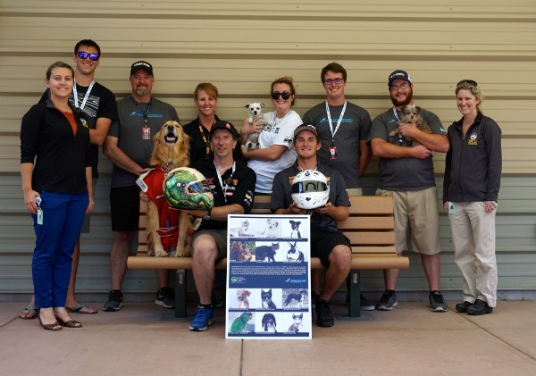 Poland (back row, third from right) and his crew of family and friends at the SPCA of Monterey County. (Image courtesy Mazda Motorsports)