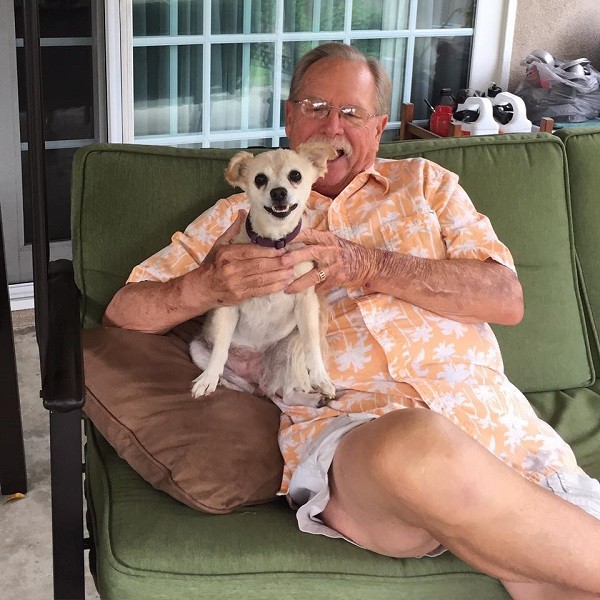 My dad with Dot. This didn't last long before Riggins came over to collect his love.