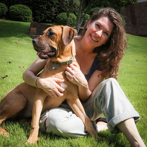 Mandy and me, a month after her rescue. Though I'm sad she won't be my dog, I'm so thrilled I was able to help her find a second chance at life. Photo credit: Chris Savas