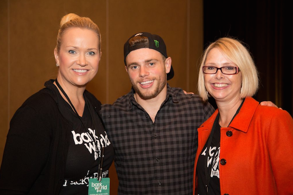 Gus Kenworthy poses with i-5 Publishing chief digital officier Jennifer Black-Glover, left, and Dogster magazine group editor Melissa Kauffman. (Photo by Gina Cioli/i-5 Studio)