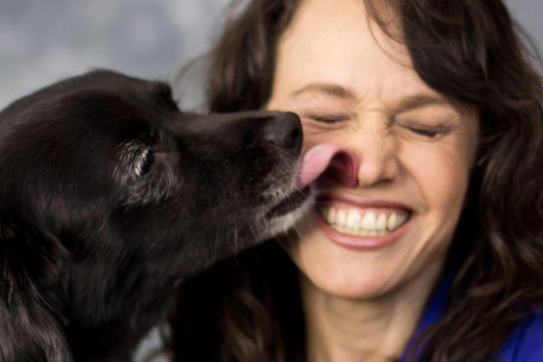 Belle gives her human a big kiss. Photo courtesy Terry Kaye