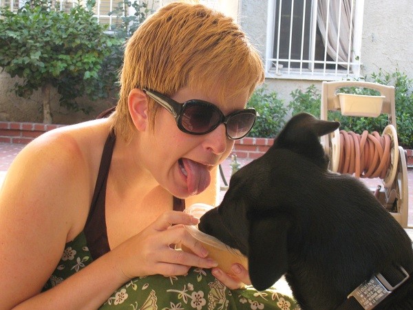Riggins and I "share" a chicken broth bday treat in the backyard for Riggins' second birthday. (Photo by Wendy Newell)