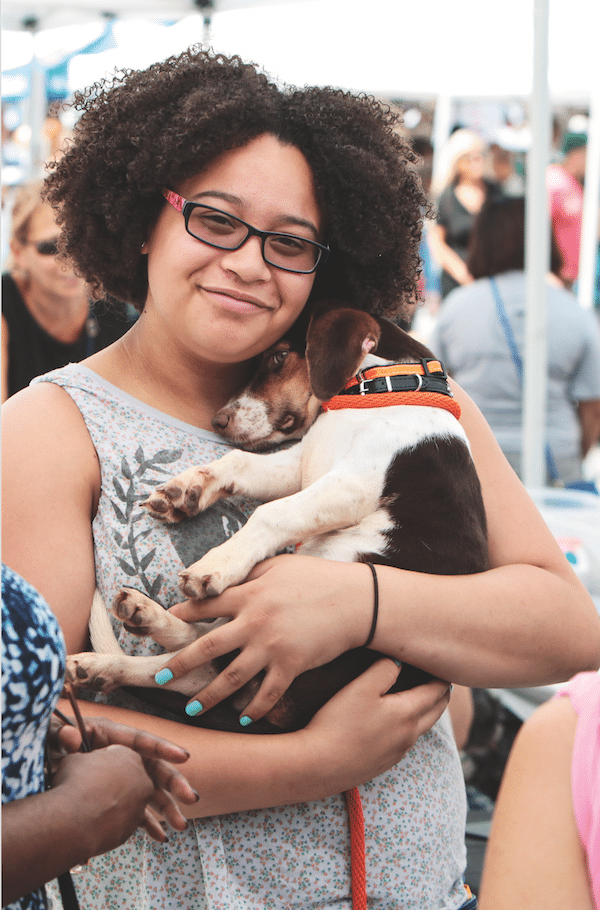 Woman volunteering with animals by iStock.