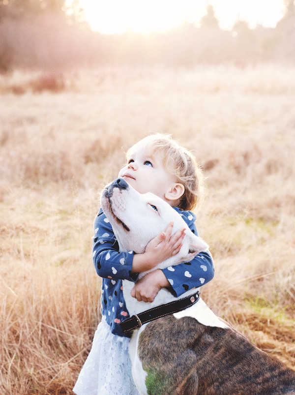 Rescued at 6 months old, Tilly lives with her forever family on a sanctuary with many other rescued animals and four human siblings, including Audrey (pictured). (Photo by Meghan Lawson)