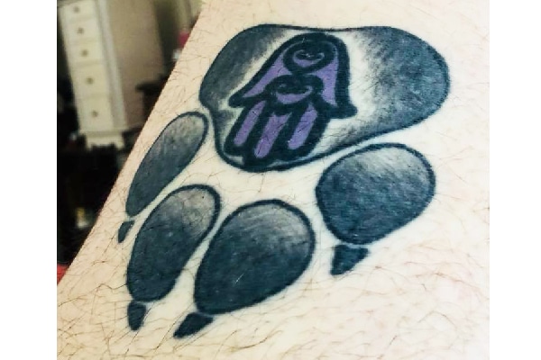 Jae's dog tattoo.