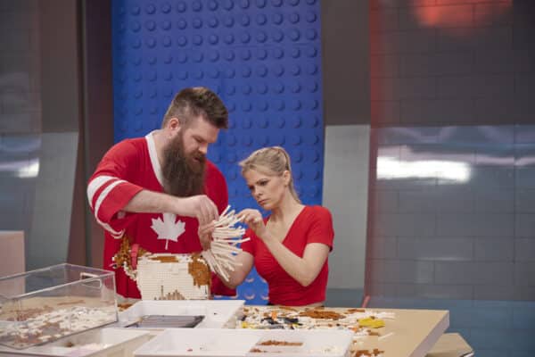 LEGO MASTERS: L-R: Contestants Dave and Emily in the “Brickminster Dog Show” episode of LEGO MASTERS airing Wednesday, Oct. 19 (9:02-10:00 PM ET/PT) on FOX. ©2022 FOX MEDIA LLC. CR: Tom Griscom/FOX