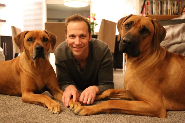 greg hurwitz with 2 ridgeback dogs