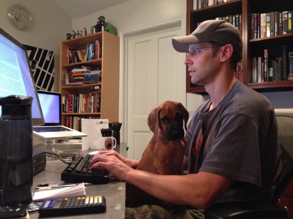 dog keeping writer company