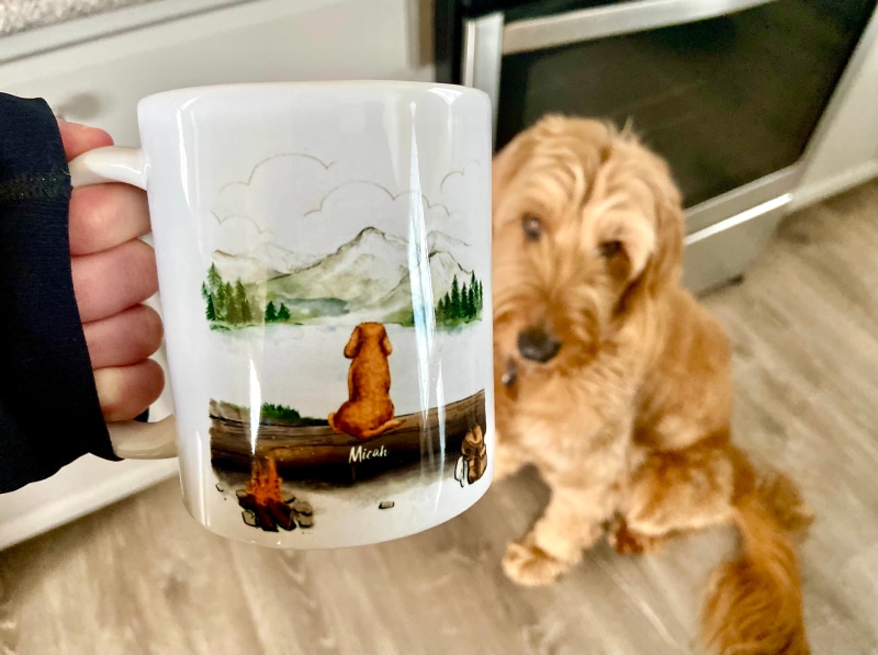 Unifury Mug - product in hand with Micah on the background