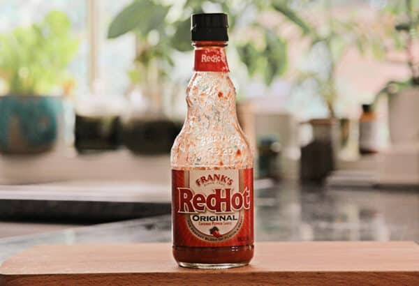 a bottle of frank's red hot sauce