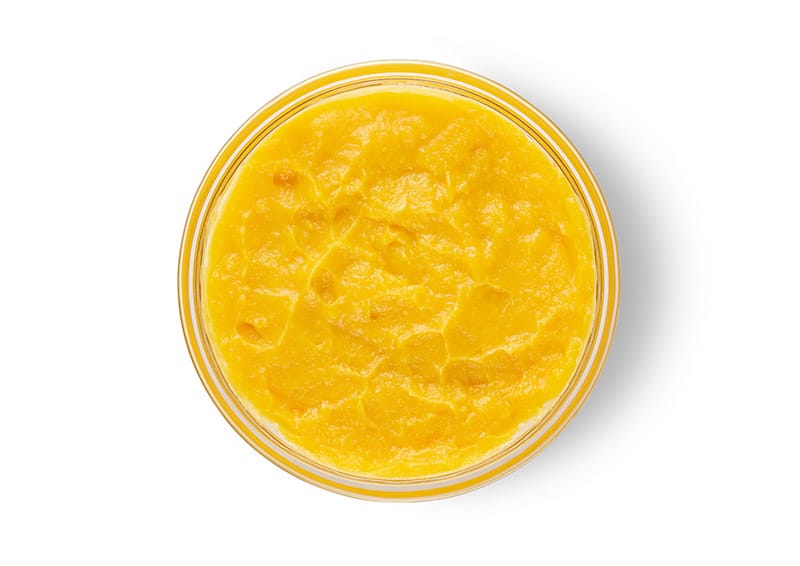 a bowl of mashed mango