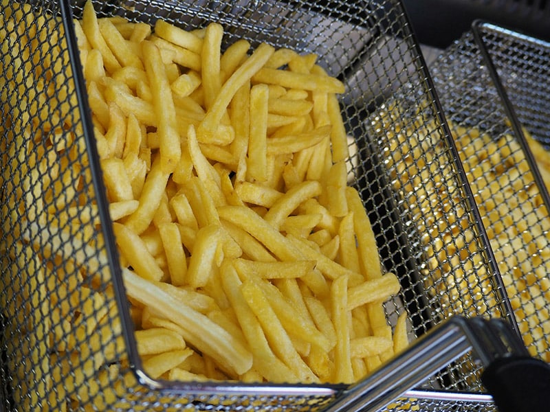french fries in deep fryer