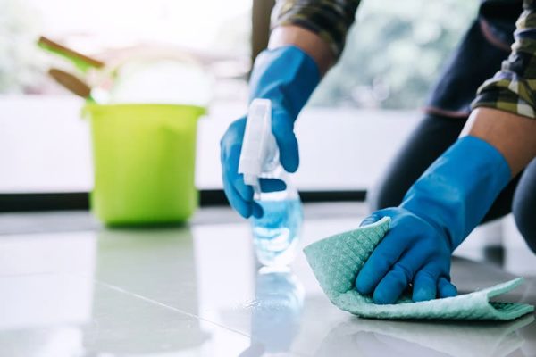 person cleaning the floor