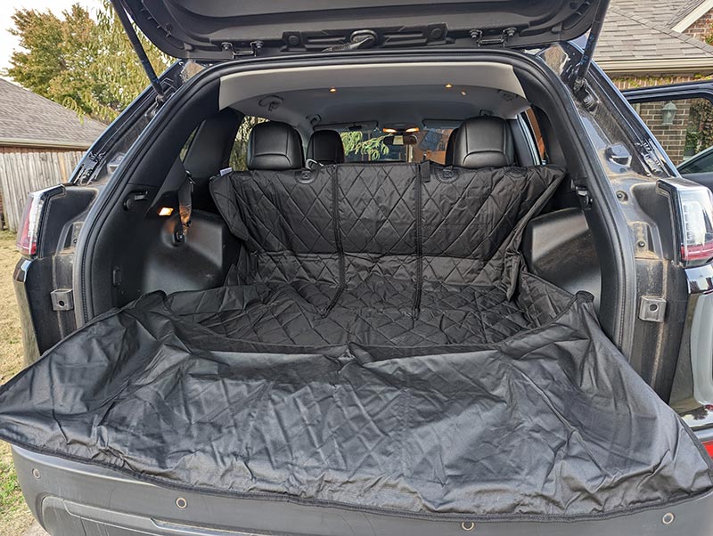 4knines dog split suv cargo liner in a car