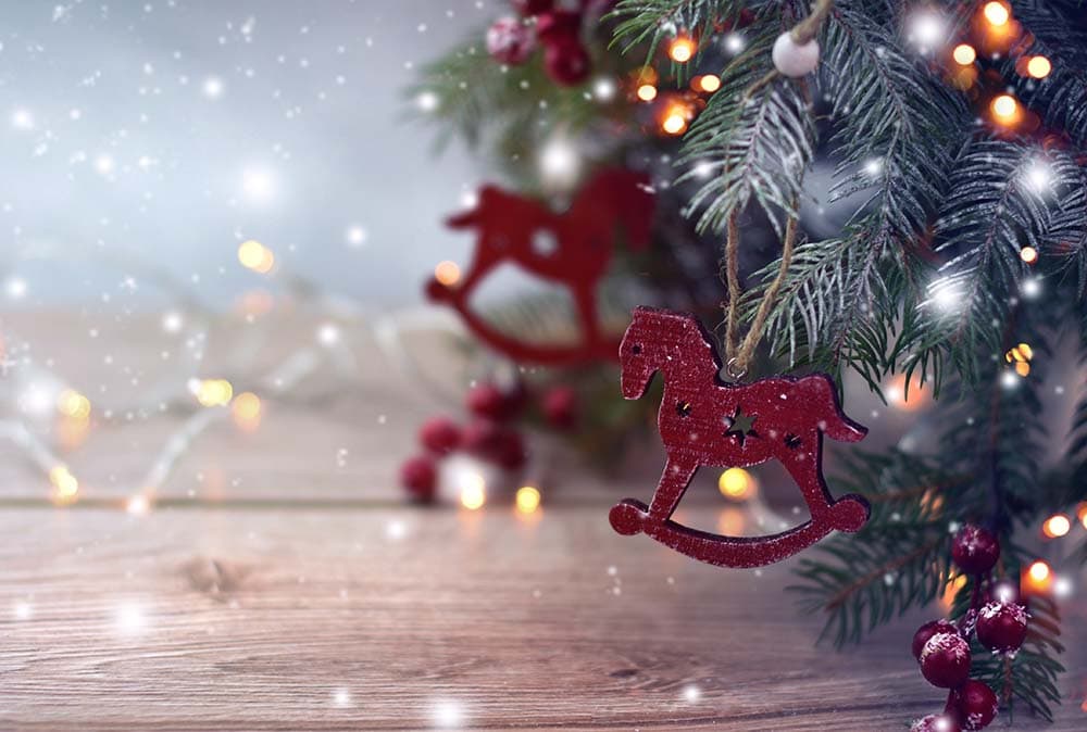 Christmas composition with wooden toy rocking horse