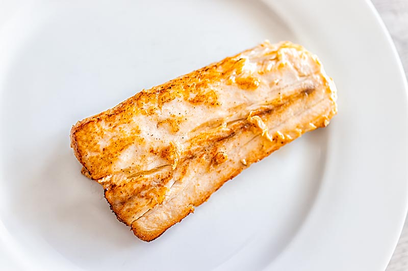Grilled baked or fried mahi mahi seafood fish closeup