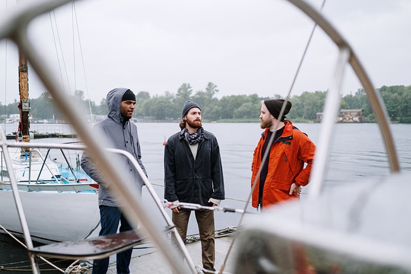 Men Standing on the Dock