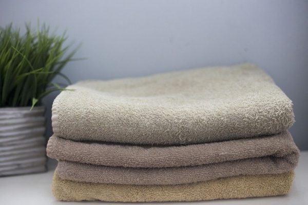 Towels stacked on table