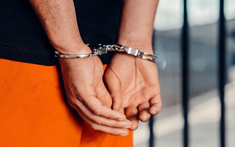 a person in handcuffs
