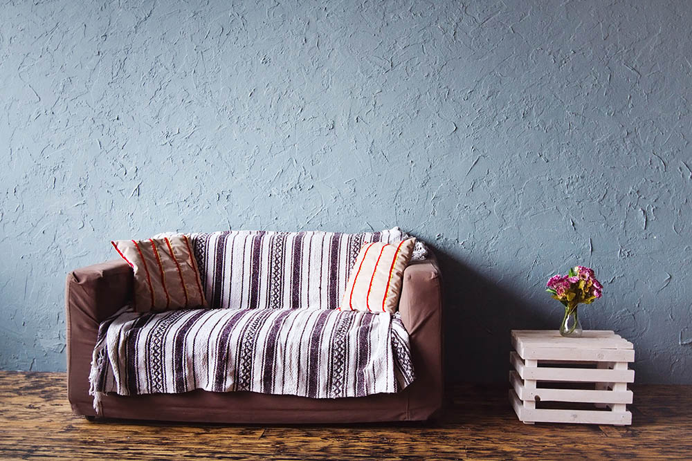 brown sofa with cover