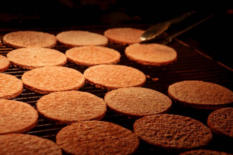 burger patties on the grill