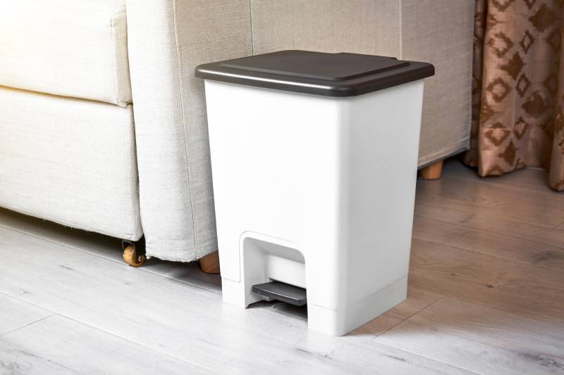 footbath bin beside the sofa