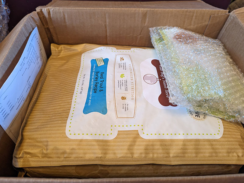 pawtree dog food and treats in the box