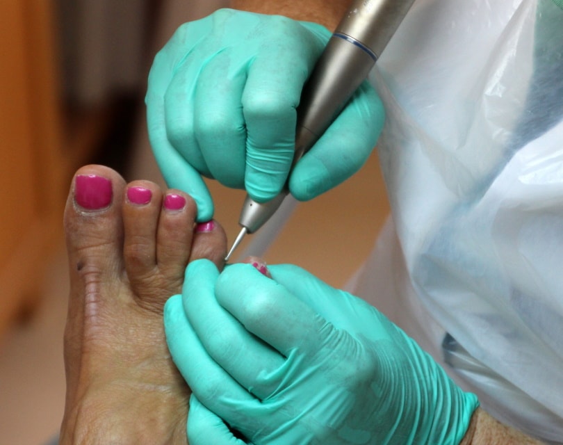 woman having pedicure