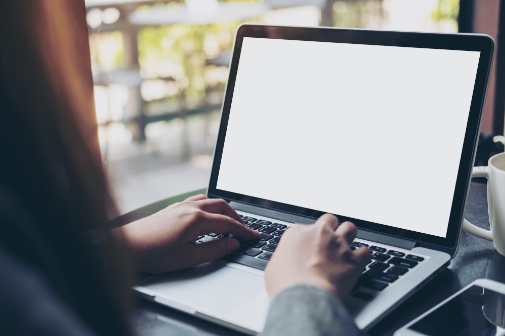 woman using her laptop