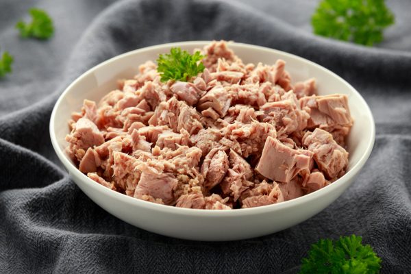 Canned tuna fish in white bowl