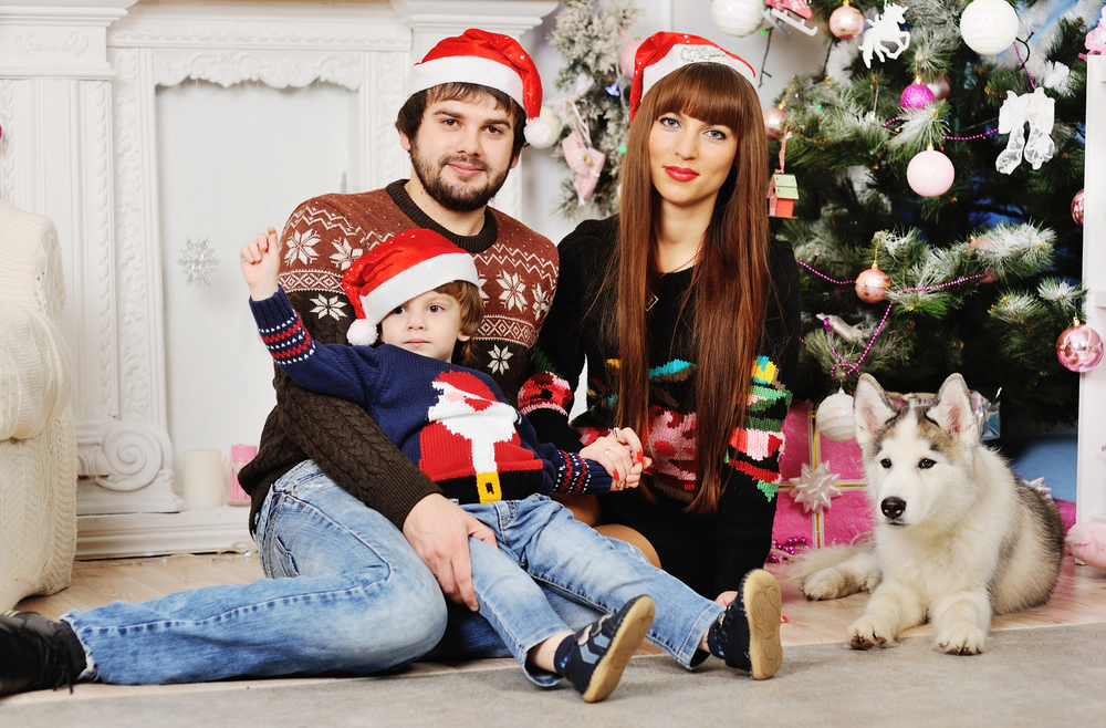 a Christmas family photo with pet