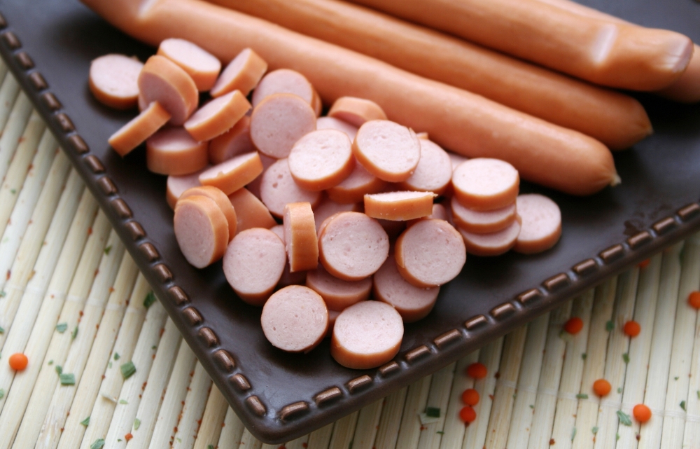 close up of sliced vienna sausages
