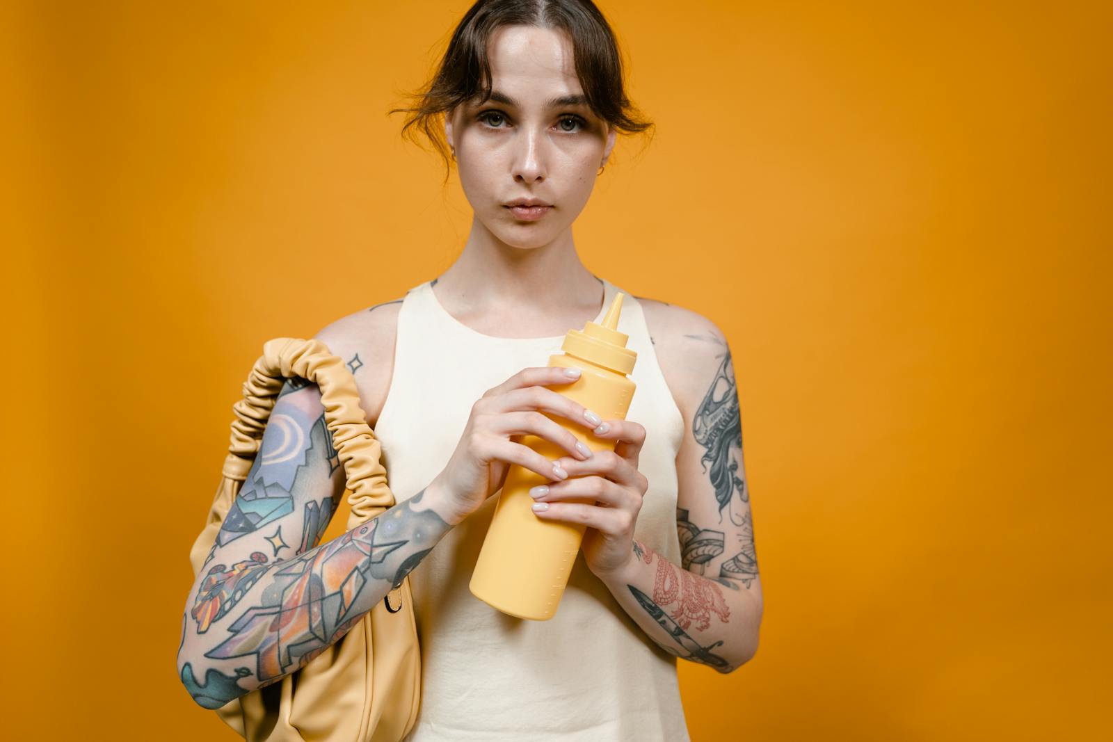 Woman holding a Squeeze Bottle