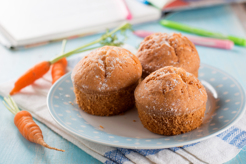 Freshly baked carrot cupcakes on a plate