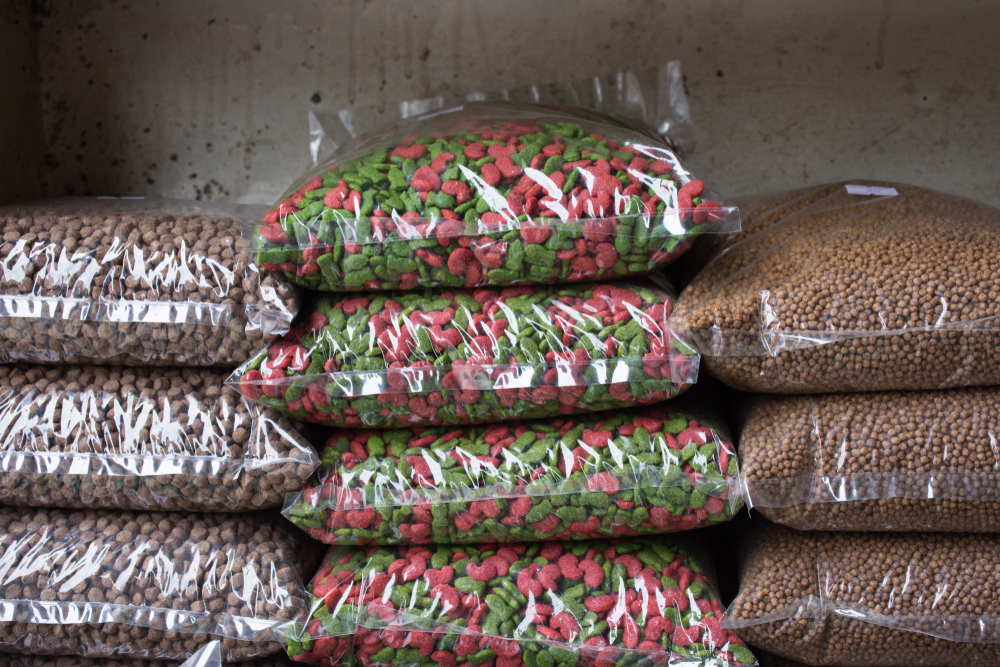 Row of animal feed package on shelf