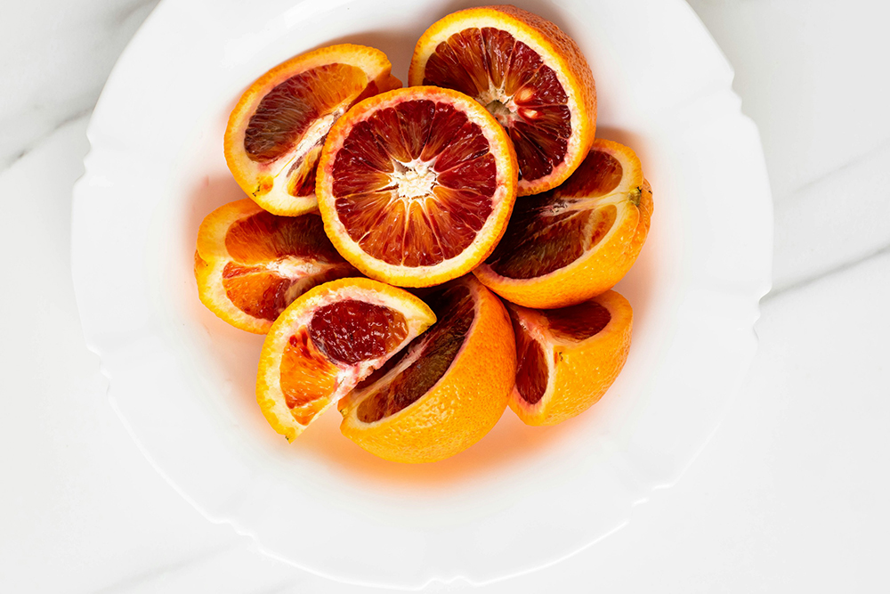 a bowl of blood orange slices