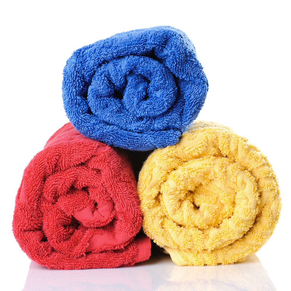 stack of rolled multicolor towels