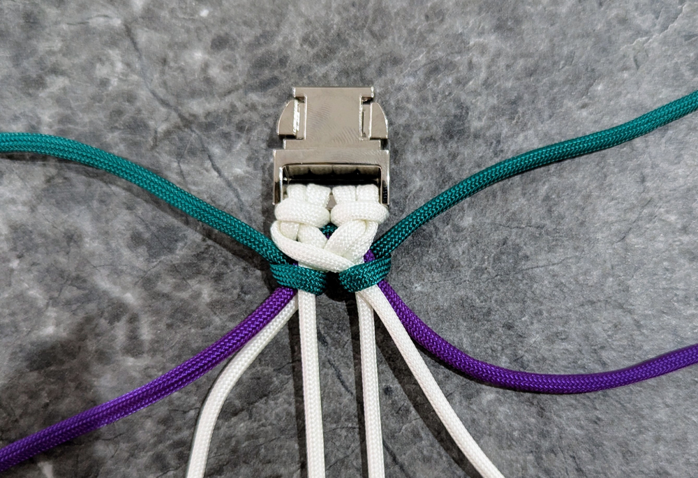 18. Pull the loop closed and adjust the strands so the knots are firm