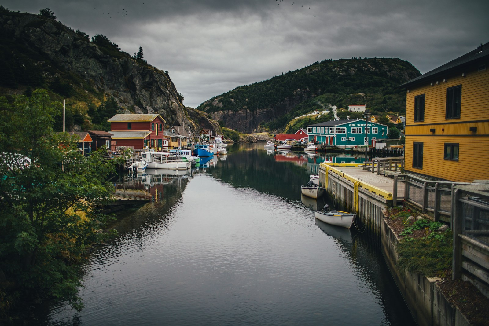 Robinsons Newfoundland & Labrador a body of water with boats and buildings along it